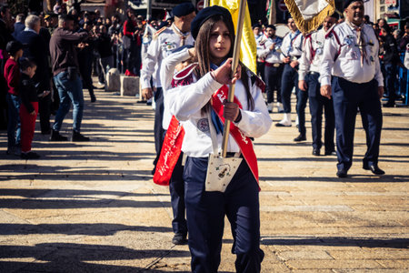 Bethlehem, West Bank, December 24, 2025 Close-up of a young Palestinian scout during the annual...