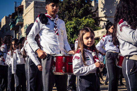 Bethlehem, West Bank, December 24, 2025 Close-up of a young Palestinian scout during the annual...