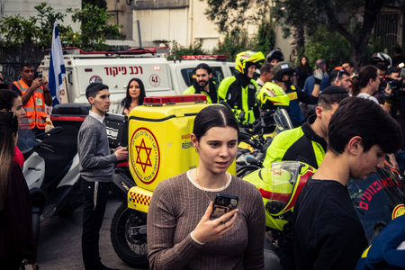 Tel Aviv, Ramat Gan, Israel, March 18, 2026 Emergency services including firefighters, paramedics,...