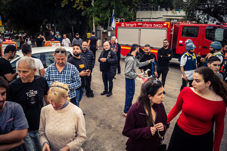 Tel Aviv, Ramat Gan, Israel, March 18, 2026 Emergency services including firefighters, paramedics,...