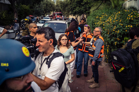 Tel Aviv, Ramat Gan, Israel, March 18, 2026 Emergency services including firefighters, paramedics,...