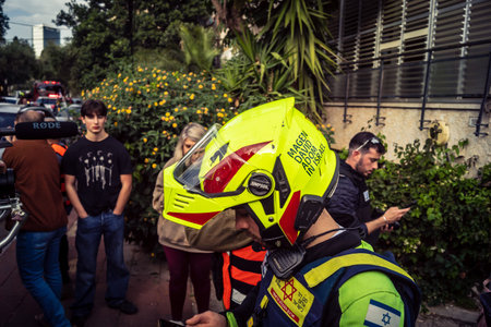 Tel Aviv, Ramat Gan, Israel, March 18, 2026 Emergency services including firefighters, paramedics,...