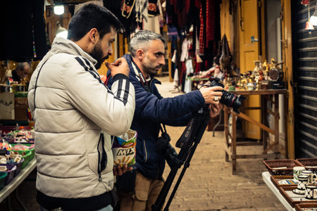 Hebron, West Bank, February 9, 2026 Media crews and journalists film reports near the Ibrahimi Mosque after its sudden closure by Israeli forces. Press documenting the rising tensions in the Old City.のeditorial素材