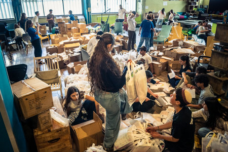 Tel Aviv, Israel,Â  March 5, 2026 Groups of young Israeli volunteers assemble and pack...