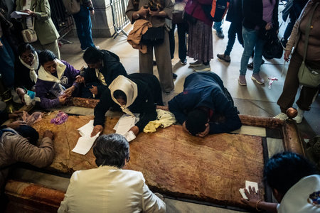 JERUSALEM, ISRAEL - FEBRUARY 21, 2026 Orthodox priest standing in the Church of the Holy Sepulchre...