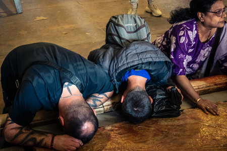 JERUSALEM, ISRAEL - FEBRUARY 21, 2026 Orthodox priest standing in the Church of the Holy Sepulchre in Jerusalem. Guardian of sacred tradition and millennial faith within the sanctuary of Christendom.のeditorial素材