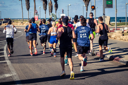 Tel Aviv, Israel, February 27 2026 Large crowd of runners competing in the streets during the annual...