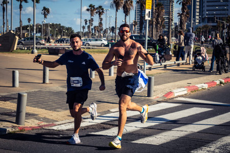 Tel Aviv, Israel, February 27, 2026 A participant makes direct eye contact and waves at the camera,...