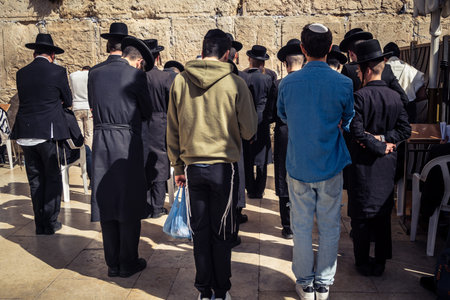 Jerusalem, Israel - February 18, 2026. Wide perspective of the Western Wall plaza showing the crowd of worshippers. The vibrant heart where sacred meets history.のeditorial素材