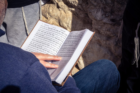 Jerusalem, Israel - February 18, 2026. Close-up of Jewish men absorbed in studying the Torah or...