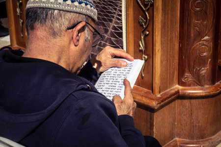 Jerusalem, Israel - February 18, 2026. Close-up of Jewish men absorbed in studying the Torah or...