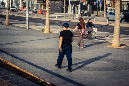 Tel Aviv, Israel, â€‹March 16, 2026 Local residents and international tourists enjoy a walk...