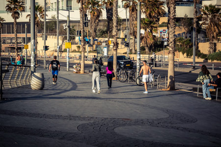 Tel Aviv, Israel, â€‹March 16, 2026 Local residents and international tourists enjoy a walk...