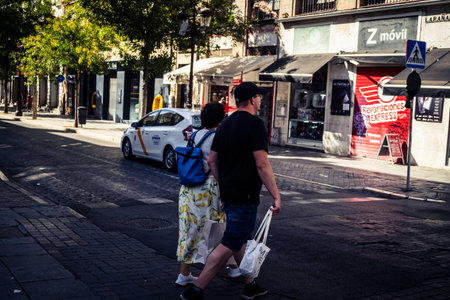 Seville, Spain, September 21, 2025 Tourists visit the historic district of downtown Seville and walk through the narrow, picturesque streets.のeditorial素材