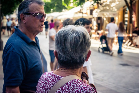 Seville, Spain, September 21, 2025 Tourists visit the historic district of downtown Seville and walk through the narrow, picturesque streets.のeditorial素材