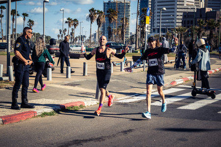 Tel Aviv, Israel, February 27, 2026 A participant makes direct eye contact and waves at the camera,...