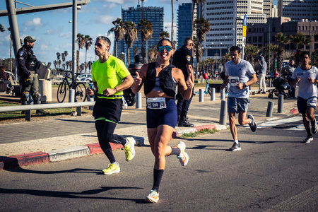 Tel Aviv, Israel, February 27, 2026 A participant makes direct eye contact and waves at the camera,...