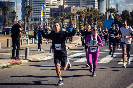 Tel Aviv, Israel, February 27, 2026 A participant makes direct eye contact and waves at the camera,...
