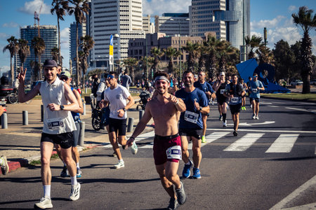Tel Aviv, Israel, February 27, 2026 A participant makes direct eye contact and waves at the camera,...