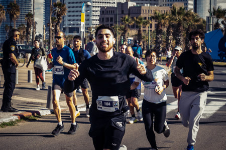 Tel Aviv, Israel, February 27, 2026 A participant makes direct eye contact and waves at the camera,...