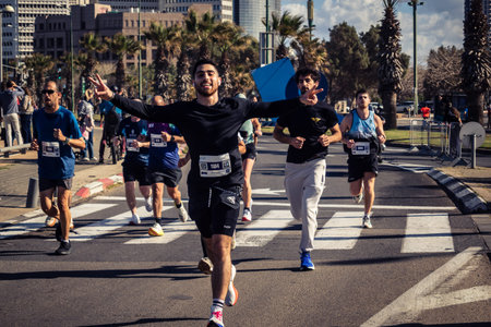 Tel Aviv, Israel, February 27, 2026 A participant makes direct eye contact and waves at the camera,...