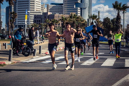 Tel Aviv, Israel, February 27, 2026 A participant makes direct eye contact and waves at the camera,...