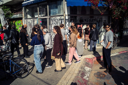 Tel Aviv, Israel, March 22, 2026 People rushing into a public bomb shelter or miklat and waiting...
