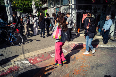 Tel Aviv, Israel, March 22, 2026 People rushing into a public bomb shelter or miklat and waiting inside during an air raid siren in the Florentin neighborhood while seeking protection during a missile attack.のeditorial素材