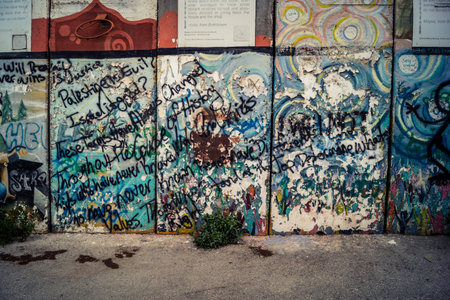 Bethlehem, West Bank, Palestine, March 23, 2026 Colorful and provocative political graffiti, murals,...