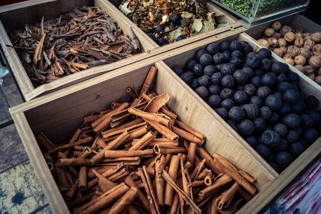 Hebron, West Bank, Palestine, March 25, 2026 Inside a traditional and bustling Palestinian grocery store specialized in bulk spices, dried fruits, and nuts in the heart of the historic old city of Hebron. The market stall is a sensory oasis, displaying doのeditorial素材