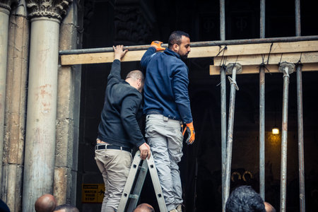 Jerusalem, Israel, 19 February 2026. Historic removal of the 3-ton Holy Sepulchre portal. First structural restoration in centuries, requiring millimeter precision to preserve the Byzantine doorway.のeditorial素材