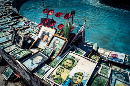 Tel Aviv, Israel, February 25 2026, public memorial site with portraits and tributes, a space of...