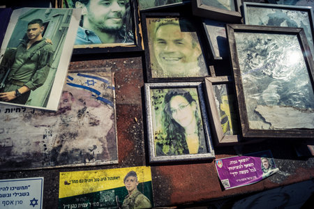 Tel Aviv, Israel, February 25 2026, public memorial site with portraits and tributes, a space of...