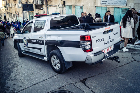 Bethlehem, West Bank, December 24, 2025 Palestinian police car are stationed near the main...