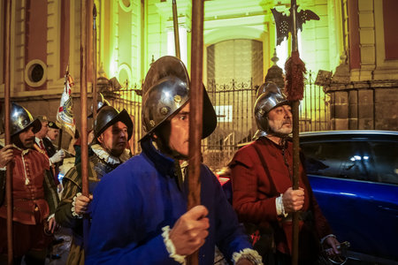 Seville, Spain, December 7, 2025 People in 16th century military uniforms of the The Spanish Tercios, participate in the mass for the Immaculate Conception at the Real Monasterio de San Leandro.のeditorial素材