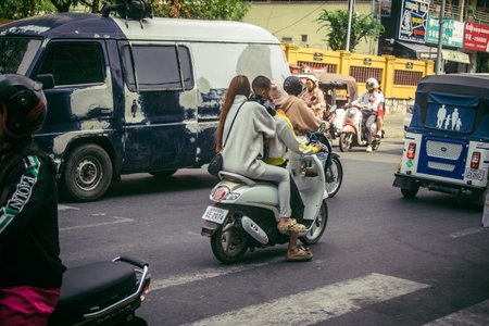 Sihanoukville, Cambodia, February 3, 2025 Traffic in the streets of Sihanoukville, a coastal city in Cambodia. Renowned for its rich cultural heritage, bustling market and vibrant street life.のeditorial素材