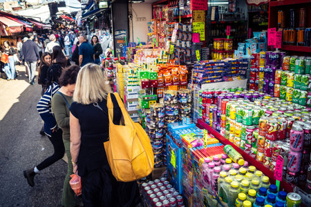 Tel Aviv, Israel, January 5, 2026 Daily life and morning bustle at the Carmel Market (Shuk HaCarmel), largest open-air marketplace. Local vendors and authentic street scenes in the heart of Tel Aviv.のeditorial素材