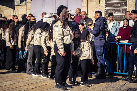 Bethlehem, West Bank, December 24, 2025 Palestinian scouts march in formation through the streets of...