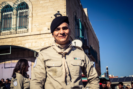 Bethlehem, West Bank, December 24, 2025 Palestinian scouts march in formation through the streets of...
