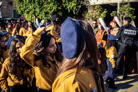 Bethlehem, West Bank, December 24, 2025 Close-up of a young Palestinian scout during the annual Christmas parade. Intense gaze testifies to the strength of character of the local youth celebrating.のeditorial素材