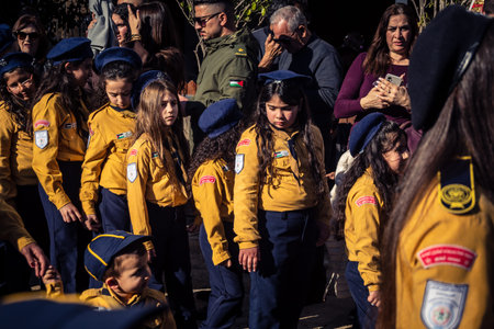 Bethlehem, West Bank, December 24, 2025 Young Palestinian scouts march in formation in the streets...
