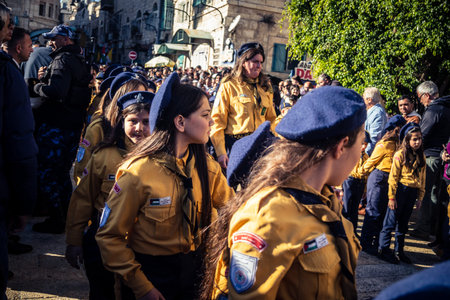 Bethlehem, West Bank, December 24, 2025 Young Palestinian scouts march in formation in the streets...