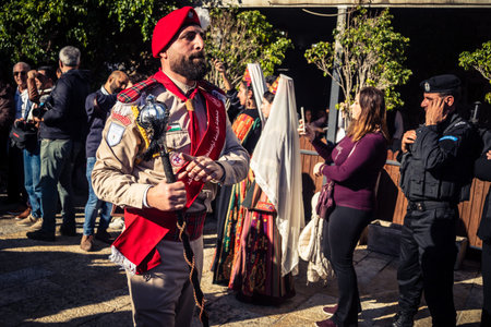 Bethlehem, West Bank, December 24, 2025 Palestinian scouts march in formation through the streets of...