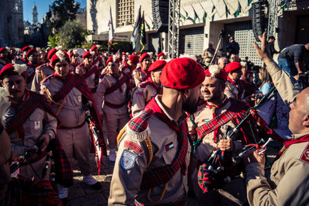 Bethlehem, West Bank, December 24, 2025 Palestinian scouts march in formation through the streets of...