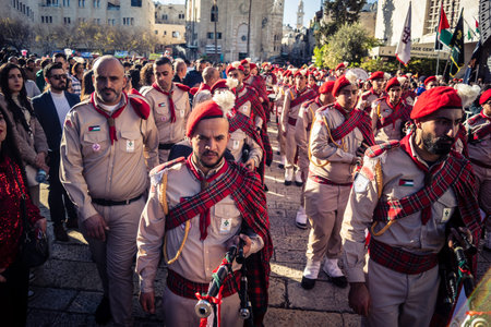 Bethlehem, West Bank, December 24, 2025 Palestinian scouts march in formation through the streets of...