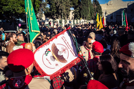 Bethlehem, West Bank, December 24, 2025 Palestinian scouts march in formation through the streets of...