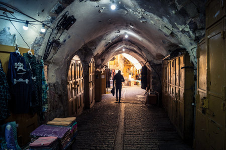 Hebron, West Bank, Palestine, March 28, 2026 The historic stone streets and ancient vaulted alleys...