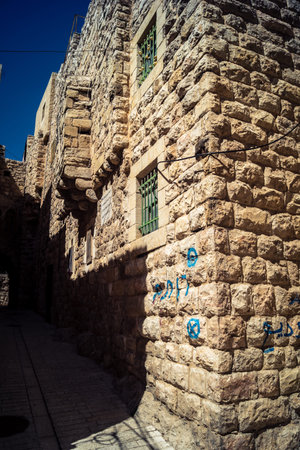 Hebron, West Bank, Palestine, March 28, 2026 The historic stone streets and ancient vaulted alleys...