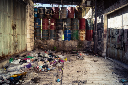Hebron, West Bank, Palestine, March 28, 2026 Metal nets and fencing are stretched high above the narrow Palestinian commercial streets in the historic old city of Hebron. These installations serve as essential protection for local residents and shoppers aのeditorial素材