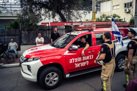 Tel Aviv, Ramat Gan, Israel, March 18, 2026 Emergency services including firefighters, paramedics,...